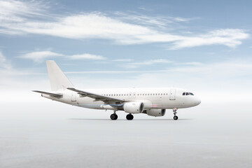 White passenger airliner isolated on bright background with sky