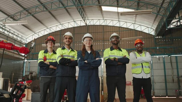 engineering team stood with their arms folded in contentment.
