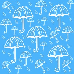 various umbrellas and blue rain drops on blue background