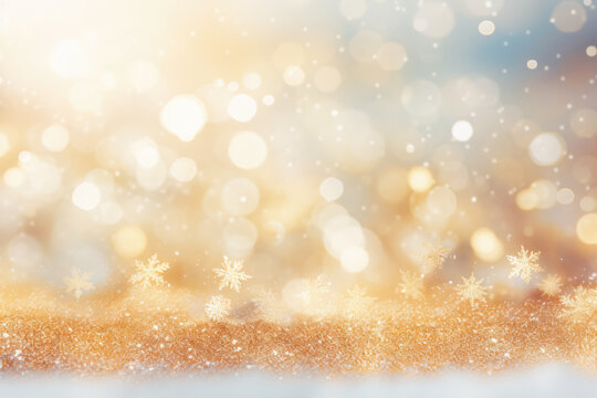 Winter snowy blurred defocused blue background, golden boleh with copy space. Flakes of snow fall. Festive Christmas and New year background