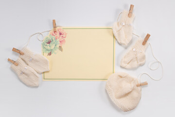 Socks and cloth-pants for baby newborn on white background. Top view