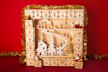 Wooden advent calendar.Sustainable Christmas, zero waste, kids seasonal activities