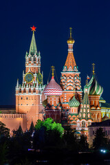 Fototapeta na wymiar Cathedral of Vasily the Blessed (Saint Basil's Cathedral) and Spasskaya Tower of Moscow Kremlin on Red Square at night, Russia