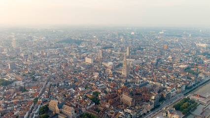 Fototapeta na wymiar Antwerp, Belgium. Panorama overlooking the Cathedral of Our Lady (Antwerp). Historical center of Antwerp. City is located on the river Scheldt (Escaut). Summer morning, Aerial View