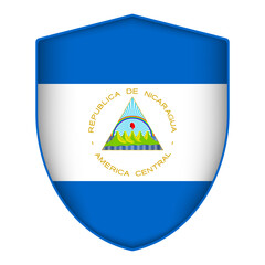 Obraz premium Nicaragua flag in shield shape. Vector illustration.
