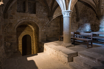 Detail of a small room in the Abbey of Mont Saint Michelle, it is a secret and very dark hidden area