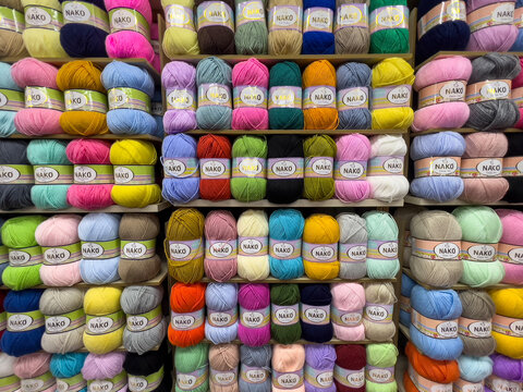 Istanbul, Turkey - Nov 11, 2023; Colorful local Turkish brand yarn balls for knitting displayed for sale in draper store or shop