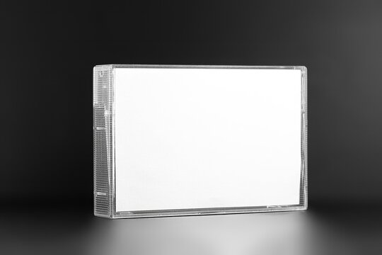 Blank compact cassette tape box design mockup view. Vintage cassete tape record case box mock up. Plastic analog magnetic tape cassette clear packaging template. Mixtape box cover.
