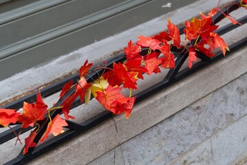 St. Petersburg, Russia, October 28, 2023. Artificial autumn leaves as an element of decorative decoration.                               