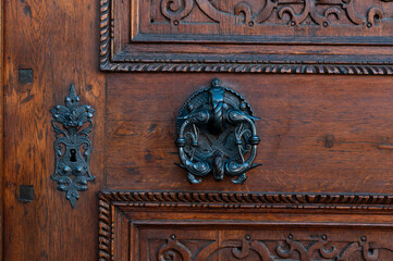 door knocker on an old wooden door in Czechia, Prague