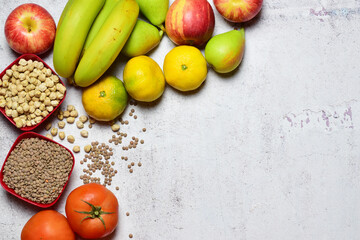 Zenith view, healthy food, fruit and legumes. Copy space.