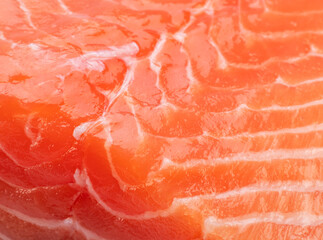 Salmon fresh pink flesh texture or salmon fillet closeup.