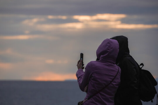 person watching sunset, friendship