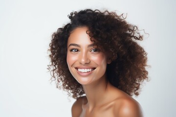 portrait of a beautiful young woman with lush hair  on white background