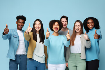 Group of young people with approving expression looking at camera showing success and like gesture on blue background. Diverse happy multiracial people holding raised thumbs ups. - obrazy, fototapety, plakaty