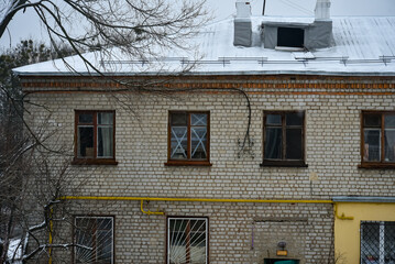A Kharkov house with windows taped shut in the first days of the war.