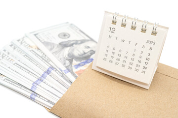 Envelope With Money And Calendar. opens envelope with money, dollars. Pension Concept. Bonus Money....