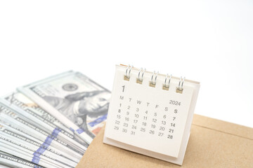 Obraz premium Envelope With Money And Calendar. opens envelope with money, dollars. Pension Concept. Bonus Money. isolated on white background.