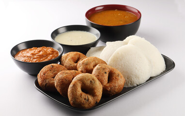 food South Indian food idli vada with sambar on a banana leaf