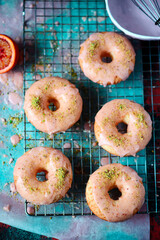 VANILLA DOUGHNUTS WITH BLOOD ORANGE GLAZ. top view