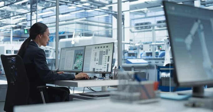 Asian Industrial Engineer Doing Creative Work on a Computer in Office. Female Creating an Innovative Motherboard with Powerful Microchips for Artificial Intelligence Systems