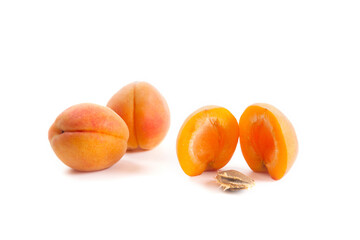 Apricot fruit whole and half isolated on white background..