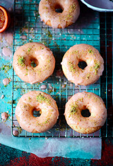 VANILLA DOUGHNUTS WITH BLOOD ORANGE GLAZ. top view
