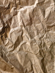 Crumpled paper. Crumpled light parchment. Vintage crumpled paper background
