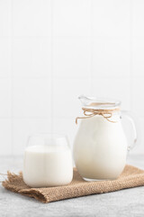Glass of milk, jug of milk, dairy products, calcium rich foods