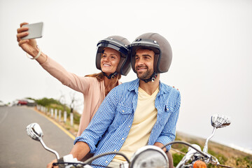 Couple, scooter and selfie on road trip for fun, adventure and vacation or holiday, romance and...
