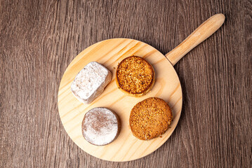 Christmas sweets on wooden background