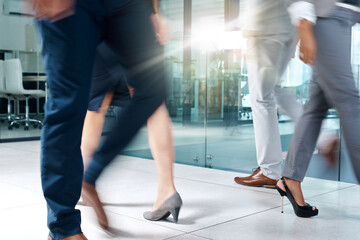 Business people, travel or legs walking in office in commute to action together for work or job....