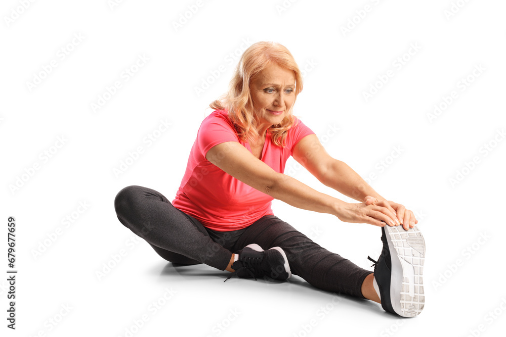 Canvas Prints mature woman stretching leg on the floor