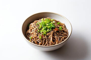 buckwheat soba noodles with green onion in a white bowl on a white background