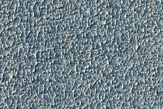 Texture of painted pebbledash surface