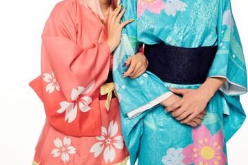 cropped view of anime couple in bright and elegant kimonos on white, japanese cosplay subculture