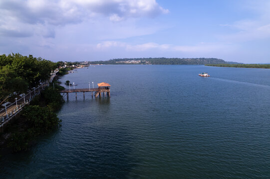 Beautiful aerial drone panoramic view of Xingu river in the Amazon rainforest on sunny summer day with blue sky. Para, Brazil. Concept of nature, ecology, global warming, climate and environment.	
