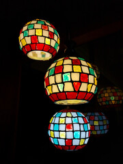 Obraz premium Red, yellow, blue and white, colorful and modern chandelier.