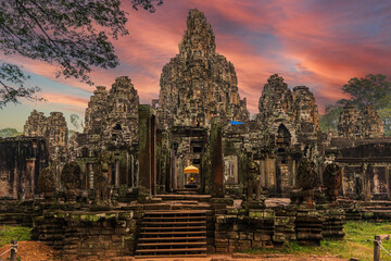 The famous Bayon temple with ancient stone faces, Angkor War, Cambodia