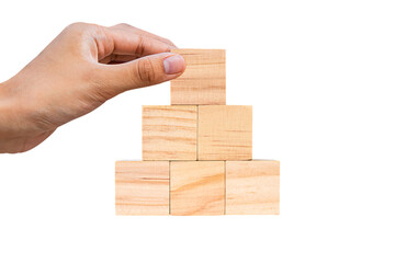 Place wooden cube blocks as a step towards the goal. Isolated on white background. Business ideas for successful growth process.