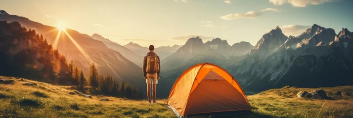 Foto op Plexiglas Serene summer day with bright sun illuminating a cozy tent in a picturesque mountain scene © Ilja