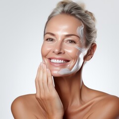 Indulge in anti-aging treatments at a spa and wellness center, where an adult woman showcases her clear, nourished skin, touching her soft, smiling face.