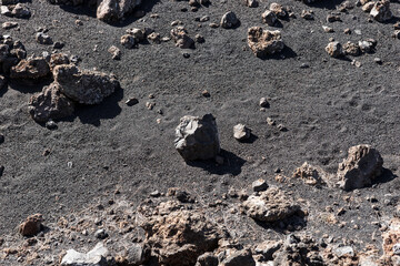 Black volcanic sand and stones in Tenerife, Canary Islands, Spain