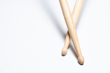 Wooden drum sticks on white background.