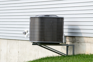 air conditioner unit attached to residential property