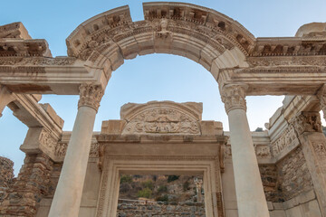 Fototapeta premium Remains of the Temple of Hadrian among the ruins of the ancient Greek and Roman City of Ephesus near Selçuk, İzmir Province, Turkey (Türkiye)