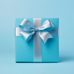 blue gift box with blue ribbon