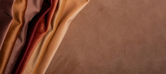 Banner with bright collection of velour textile samples. Multicolor Fabric texture background....