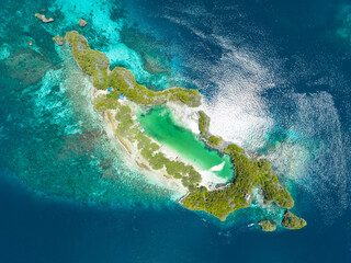Idyllic Rufas Island, near Penemu in Raja Ampat, is surrounded by healthy corals and open ocean. This island, as well as those in the region, support some of the highest marine biodiversity on Earth.