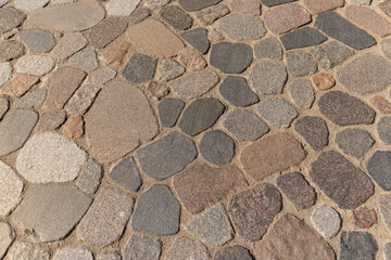 details of a highway made of stones and cobblestones